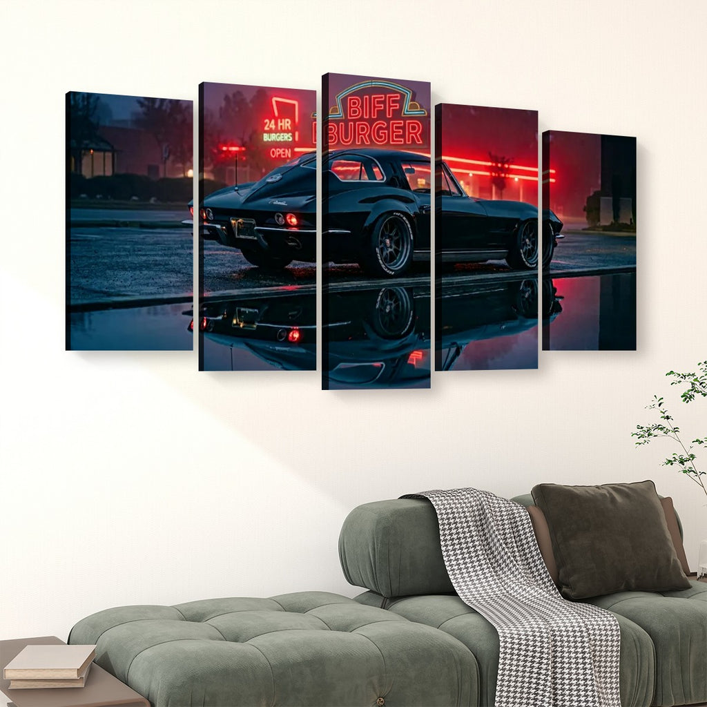 A 5-panel canvas wall art set depicting a black 1963 Split Window Chevy Corvette sports car at night with a glowing red 'Biff Burger' neon sign, displayed on a white wall above a green sofa in a living room setting.