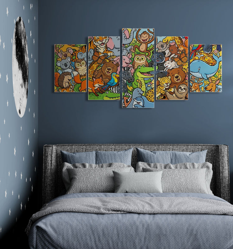 A five-panel canvas wall art set depicting a colorful cartoon animal nursery scene, displayed on a dark blue-gray bedroom wall above a bed with gray bedding.