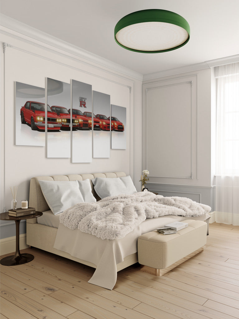 Modern bedroom with a bed, nightstands, and wall art of red cars.