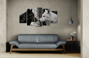 Five-panel wall art of wolves on a gray wall above a gray sofa.