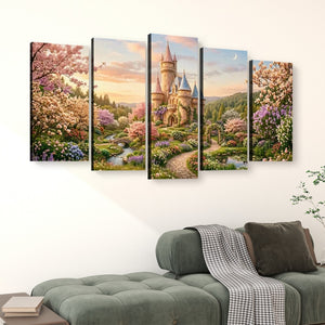 A 4-panel canvas wall art set depicting a whimsical castle in a colorful floral landscape, displayed on a white wall above a green sofa.