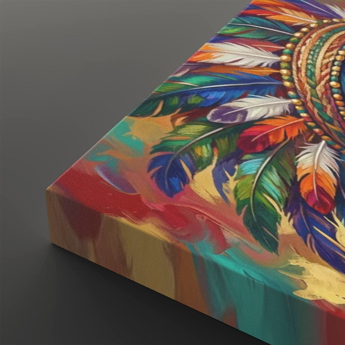 A close-up of a colorful canvas print showing a dreamcatcher design with vibrant feathers in green, blue, orange, red, and white, set against a dark gray background.