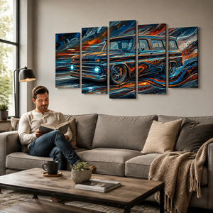 A man sits on a gray sofa in a living room, reading a book. Above the couch is a five-panel canvas wall art set depicting a stylized blue 1966 Suburban with swirling orange, red, and black brushstrokes.