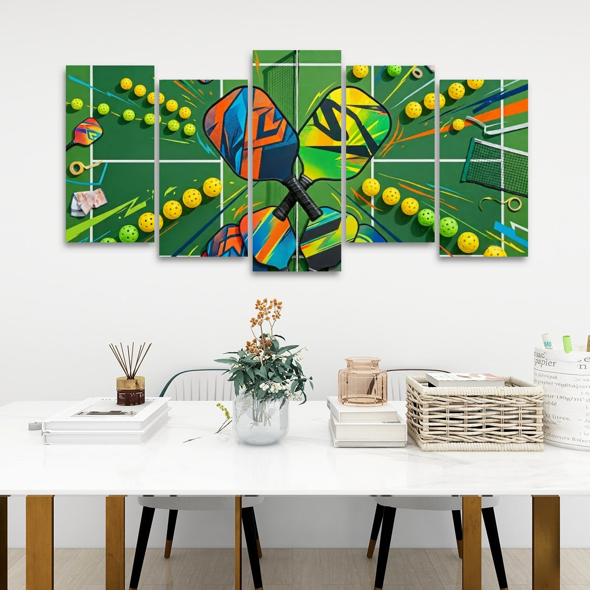 A 6-panel canvas wall art set depicting a colorful, abstract pickleball scene with a racket, balls, and net, displayed on a white wall above a styled dining table.