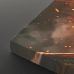 A close-up of a rectangular panel or tile with a printed abstract design in smoky gray, brown, and orange tones, with small glowing speckles and a reflective metallic-looking edge, shown on a dark gray background.