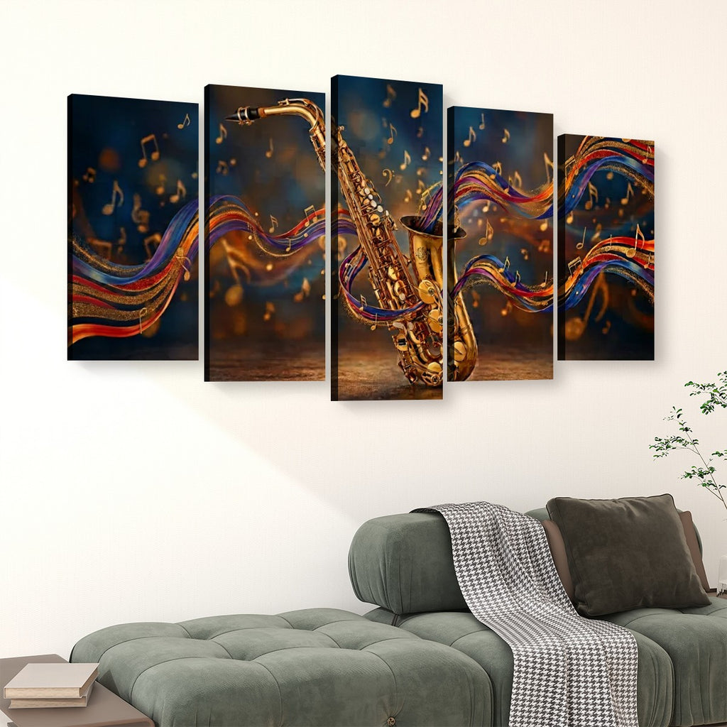 A 5-panel canvas wall art set depicting a golden saxophone with colorful flowing musical notes and ribbons against a dark blue background, displayed above a green sofa in a living room setting.