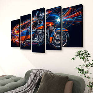 A 5-panel canvas wall art set depicting a blue and orange Road Glide type motorcycle with vibrant light trails, displayed on a wall above a green sofa in a living room setting.