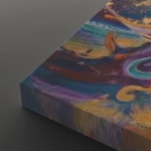 A close-up angled view of a rectangular canvas print showing an abstract painted design with swirling brushstrokes in blue, purple, yellow, orange, and brown on a dark gray background.
