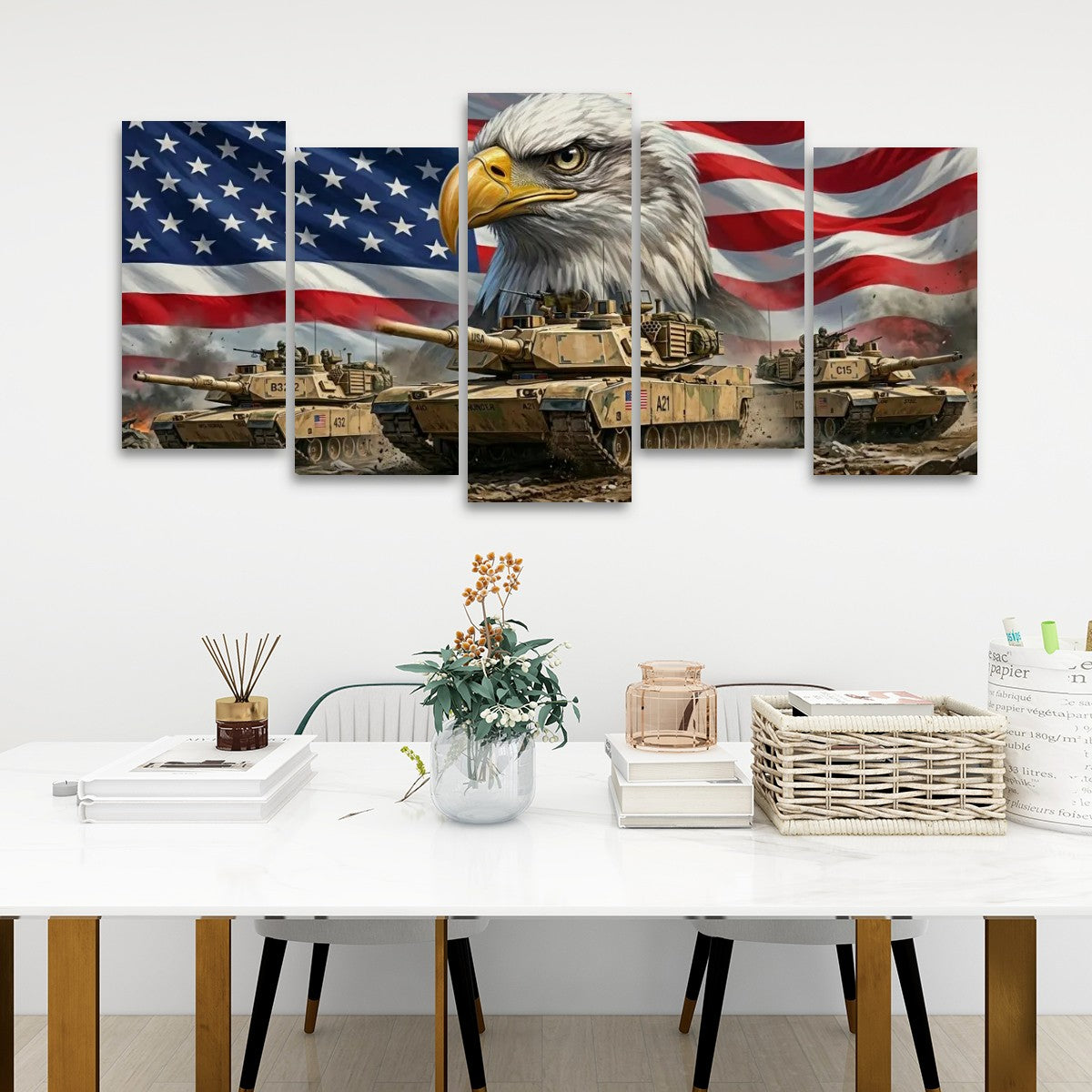 A 5-panel canvas wall art set depicting a bald eagle over military tanks with an American flag background, displayed on a white wall above a styled white table with books, a vase, and baskets.