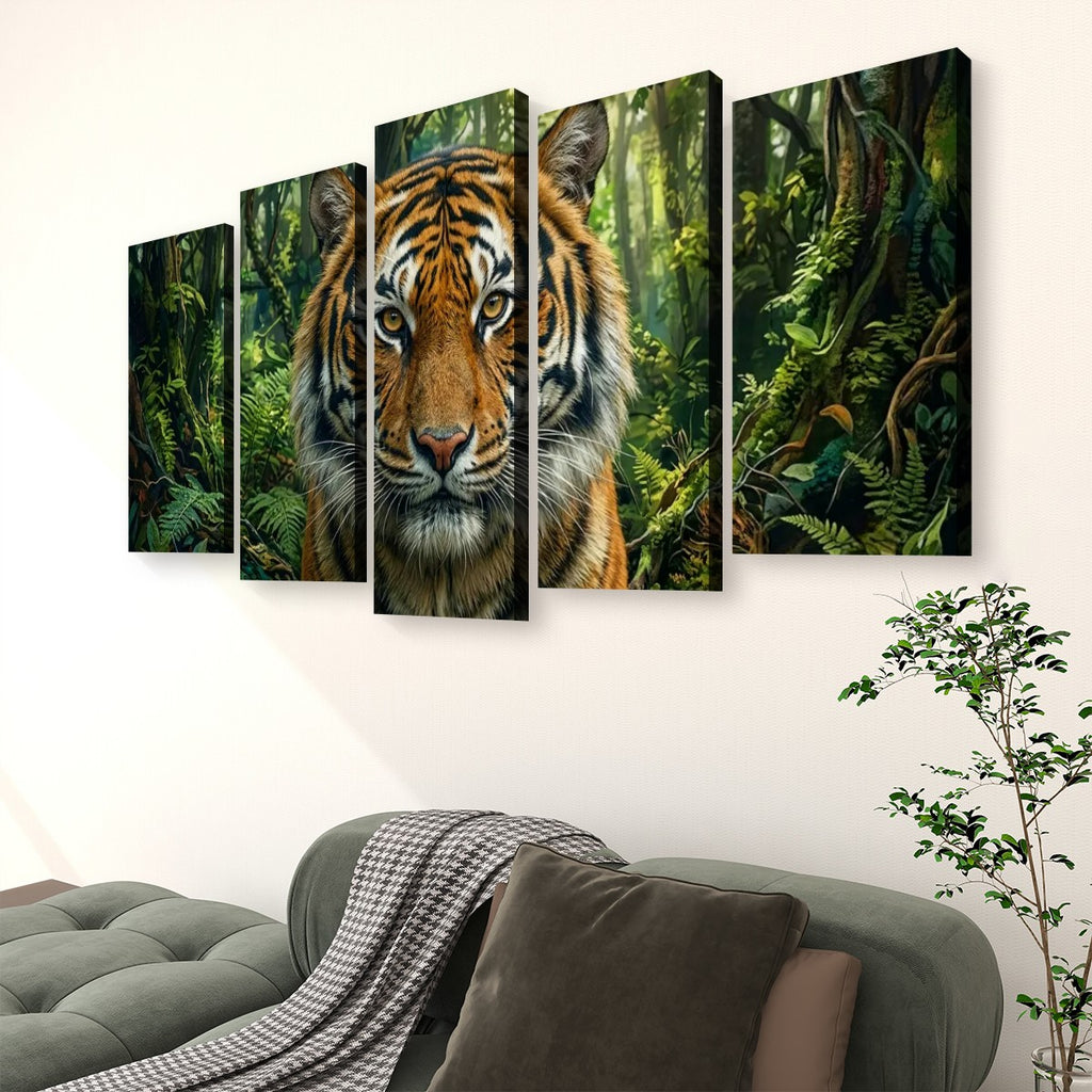 A 4-panel canvas wall art set depicting a close-up tiger face in a lush green jungle, displayed on a white wall above a gray sofa in a living room setting.