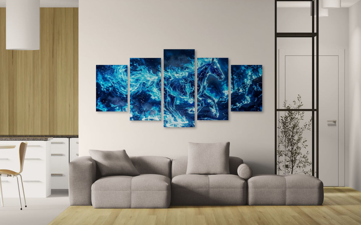 Modern living room with a gray sofa and abstract blue artwork on the wall.