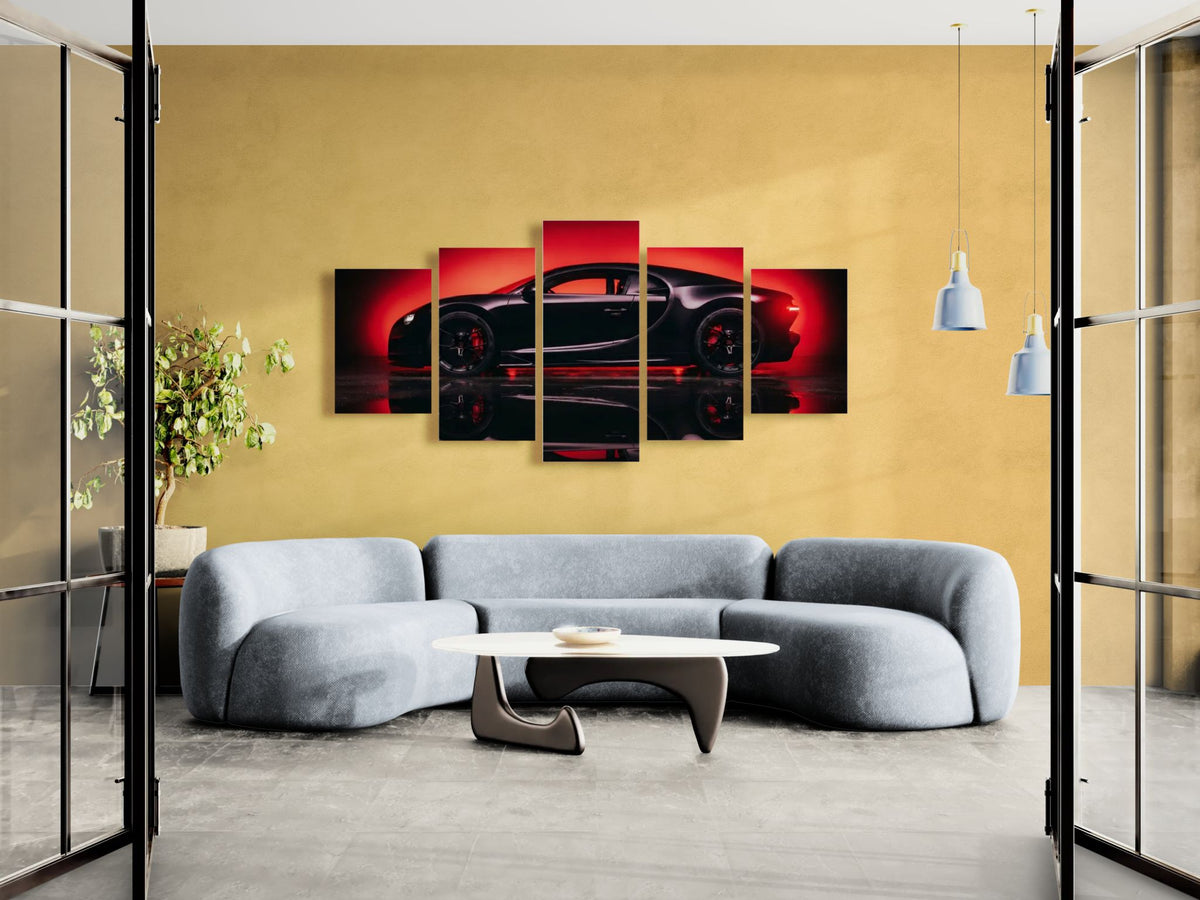 A 5-panel canvas wall art set depicting a black Bugatti Chiron sports car against a vibrant red and black background, displayed on a mustard yellow wall in a modern living room setting above a curved gray sofa.