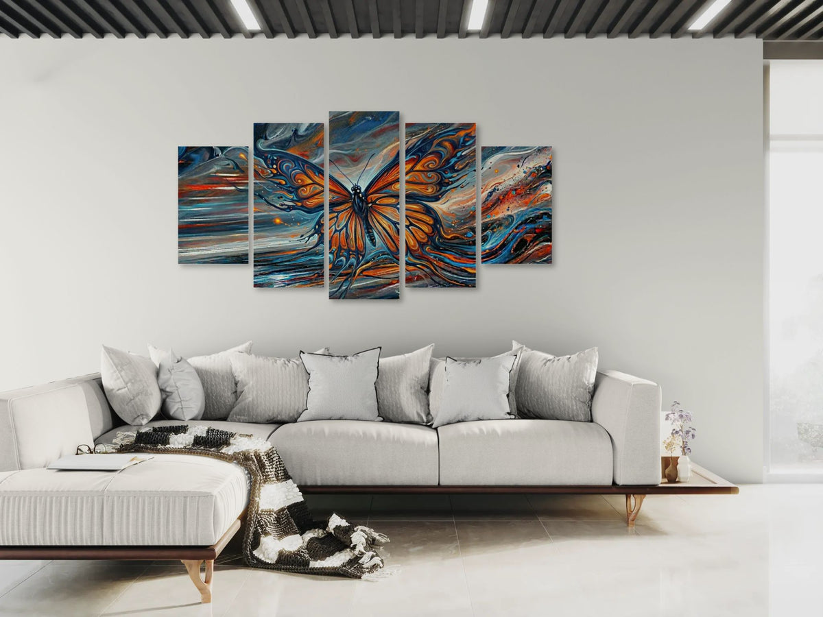 Modern living room with a large abstract butterfly painting on the wall.