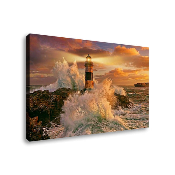 A rectangular canvas wall art print showing a coastal lighthouse surrounded by crashing waves at sunset, photographed against a plain white background.