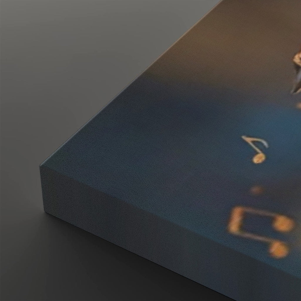 A close-up of a rectangular product, likely a book, box, or canvas, showing a dark blue textured surface with gold musical notes and a small gold emblem, photographed on a dark gray background.