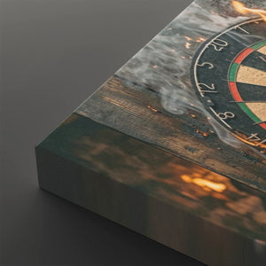 A close-up of a rectangular canvas or print showing a rustic wooden surface with a dartboard edge, smoke, and warm glowing embers, photographed on a dark gray background.