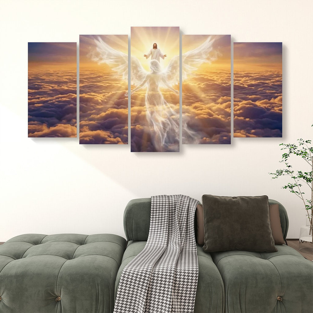 A five-panel canvas wall art set depicting a glowing angel figure above a sea of clouds at sunset, displayed above a green sofa in a living room setting.