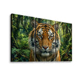 A three-panel canvas wall art set depicting a close-up tiger face in a lush green jungle, shown against a plain white background.