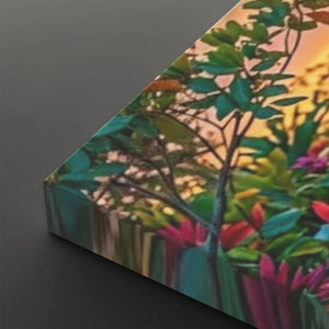A rectangular canvas or print showing a colorful outdoor garden scene with green leaves, pink and purple flowers, and a warm orange sky, photographed at an angle against a dark gray background.