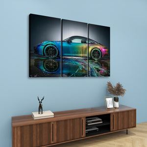 A three-panel canvas wall art set depicting a colorful sports car with a reflective multicolor paint job, displayed on a light blue wall above a wooden console table with decorative items.