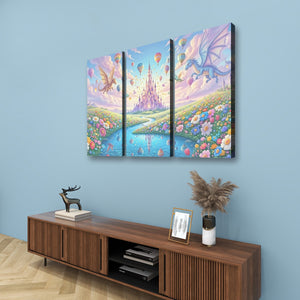 A three-panel canvas wall art set depicting a whimsical fantasy landscape with dragons, a castle, hot air balloons, and a river, displayed on a light blue wall above a wooden console table.