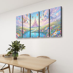 A four-panel canvas wall art set depicting a whimsical fantasy landscape with a castle, dragon, hot air balloons, and colorful fields, displayed on a white wall above a dining table with chairs and a plant.