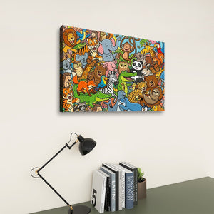A colorful canvas wall art print featuring a dense collage of cartoon animal characters, shown hanging on a light beige wall above a desk with a black lamp and books.