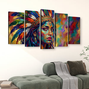 A five-panel canvas wall art set depicting a colorful portrait of a woman in a feathered headdress, displayed above a green sofa in a living room setting.
