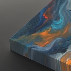Abstract canvas wall art showing a marbled fluid design with swirling blue, teal, orange, and white tones, photographed at an angle against a dark gray background.