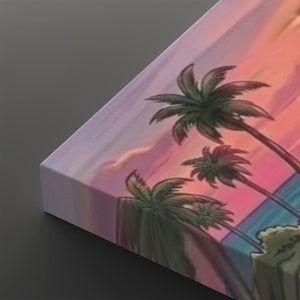 A close-up of a rectangular canvas print showing a tropical sunset scene with palm trees against pink, purple, and blue sky colors, photographed on a dark gray background.
