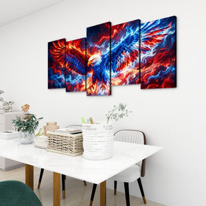 A 5-panel canvas wall art set depicting a dramatic, fiery eagle with wings spread, rendered in vivid red, orange, yellow, and blue tones. The panels are displayed on a white wall above a modern white dining table with chairs.
