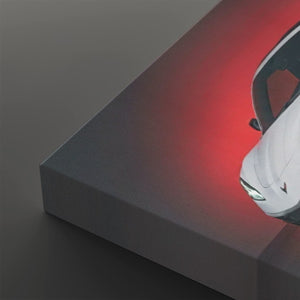 A close-up, angled view of a white vehicle body panel illuminated by a red light or reflection, set against a dark gray background.