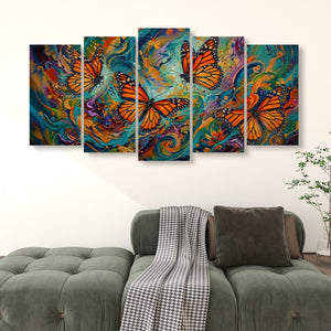 A five-panel canvas wall art set depicting vibrant orange monarch butterflies over colorful swirling abstract backgrounds, displayed above a green tufted sofa in a living room setting.
