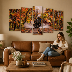 A five-panel canvas wall art set depicting a steam train traveling through an autumn forest, displayed above a brown leather sofa in a cozy living room setting with a woman reading on the couch.