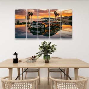 A four-panel canvas wall art print depicting a classic car at sunset reflected in water, displayed above a dining table with chairs in a modern room setting.