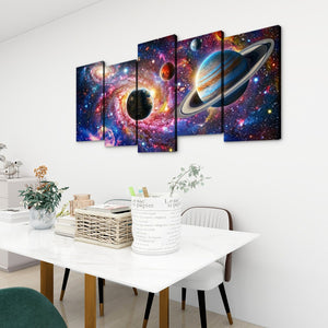 A 5-panel canvas wall art set depicting a vibrant outer space scene with planets, stars, and colorful nebulae, displayed on a white wall above a dining table in a modern room setting.
