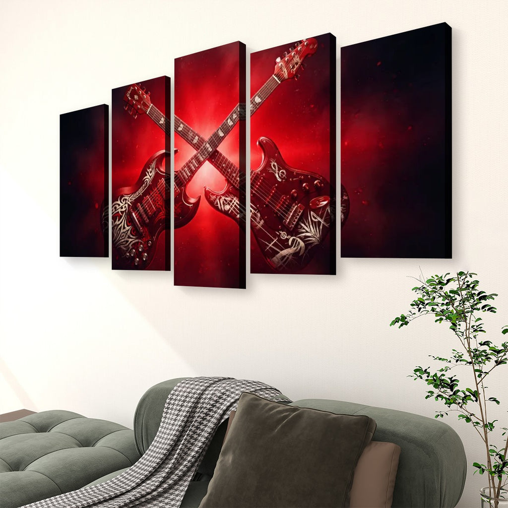 A 5-panel canvas wall art set depicting two crossed electric guitars against a dramatic red and black background, displayed on a white wall above a green sofa in a living room setting.