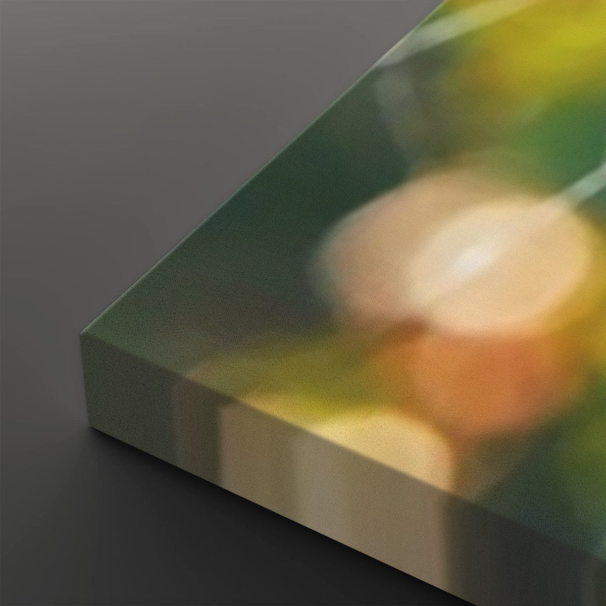 A close-up of a rectangular glass or acrylic panel with a blurred abstract print attached to one side, shown on a dark gray background.