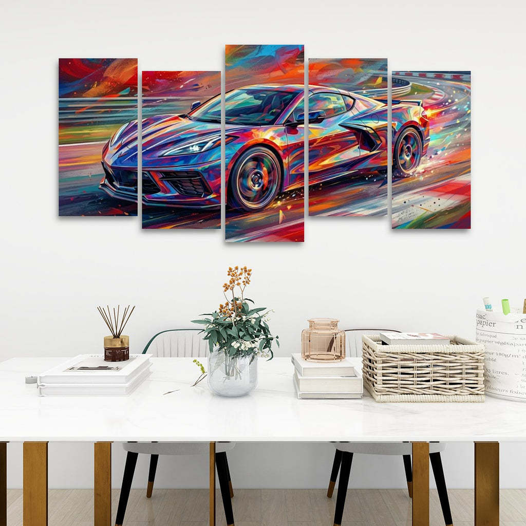 A 5-panel canvas wall art set depicting a colorful, abstract Corvette sports car in motion, displayed on a white wall above a modern dining table with books, a vase, and a basket.