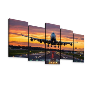 A five-panel canvas wall art set depicting a commercial airplane taking off from an airport runway at sunset, shown against a plain white background.