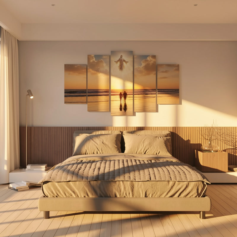A 5-panel canvas wall art set depicting a sunset beach scene with a figure walking on the sand, displayed above a bed in a modern, warm-toned bedroom.