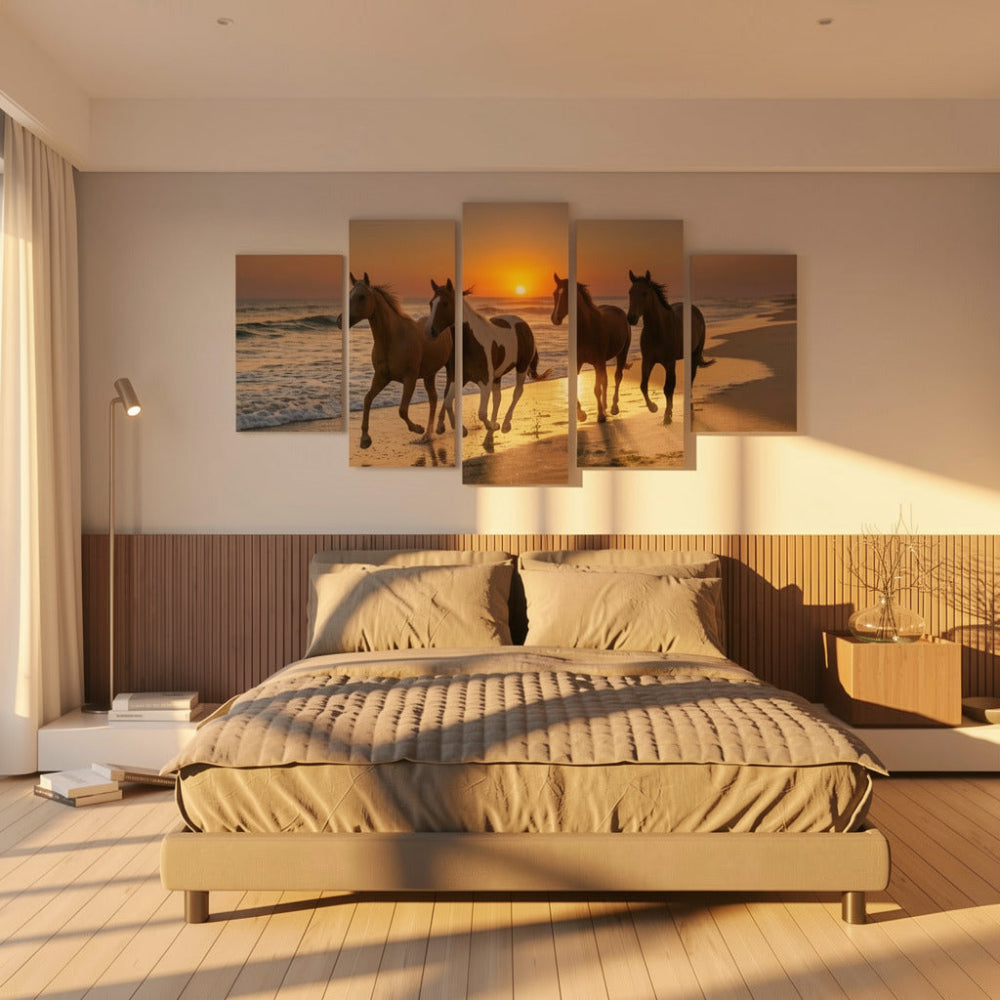 Bedroom with a large bed and wall art of horses on a beach at sunset.