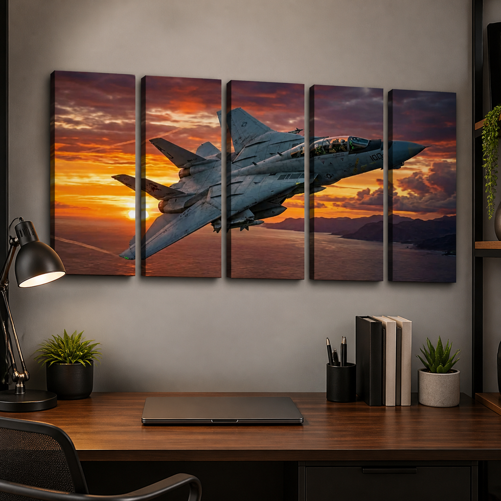 A five-panel canvas wall art set depicting a gray Grumman F-14 military fighter jet flying over a sunset seascape, displayed above a wooden desk in a modern office setting.