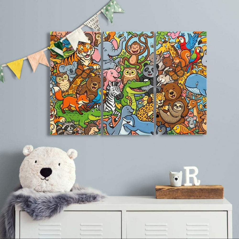A three-panel canvas wall art set featuring a colorful cartoon jungle animal illustration, displayed on a light gray wall above a white storage cabinet with a plush bear and small decor items.