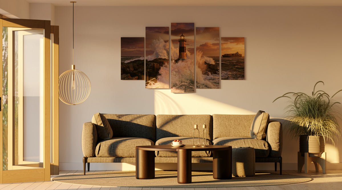 Modern living room with a sofa, coffee table, and wall art depicting lighthouses.