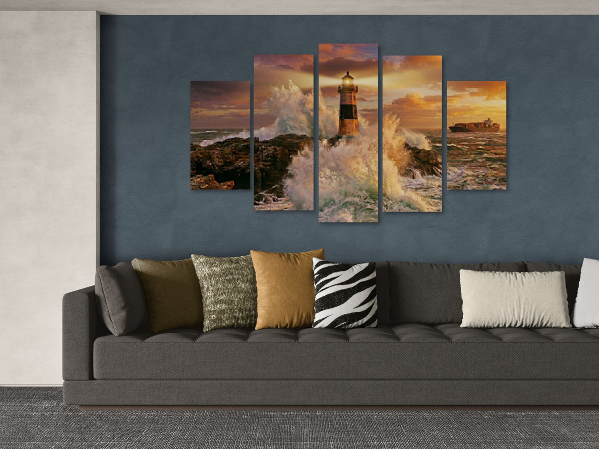Five-panel wall art depicting a lighthouse scene above a gray sofa with patterned cushions.