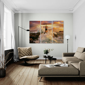 Modern living room with a triptych painting of a lighthouse on the wall.