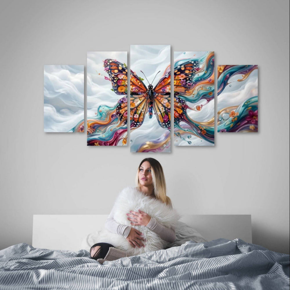 Woman sitting on a bed with a colorful Monarch butterfly painting on the wall