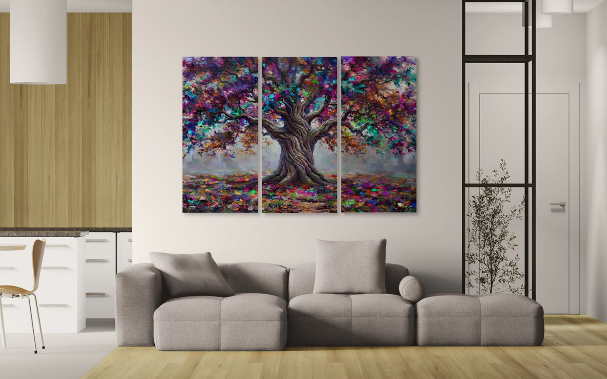 A three-panel canvas wall art set depicting a colorful tree with a dark brown trunk and vibrant purple, blue, pink, and green foliage, displayed on a white wall above a modern gray sofa in a bright living room.