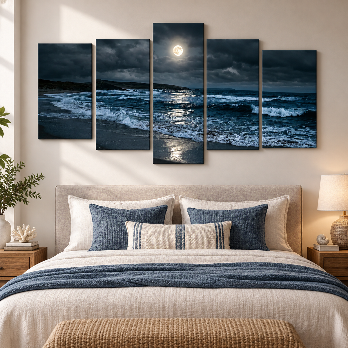 A five-panel canvas wall art set depicting a dramatic night ocean scene with waves, dark clouds, and a bright full moon, displayed above a neatly made bed in a modern bedroom setting.